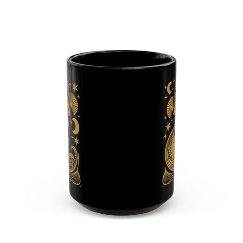 A black ceramic mug featuring a stylized golden fox design surrounded by Art Deco ginkgo fans, crescent moons, and stars. The mug has a glossy finish and ergonomic handle.
